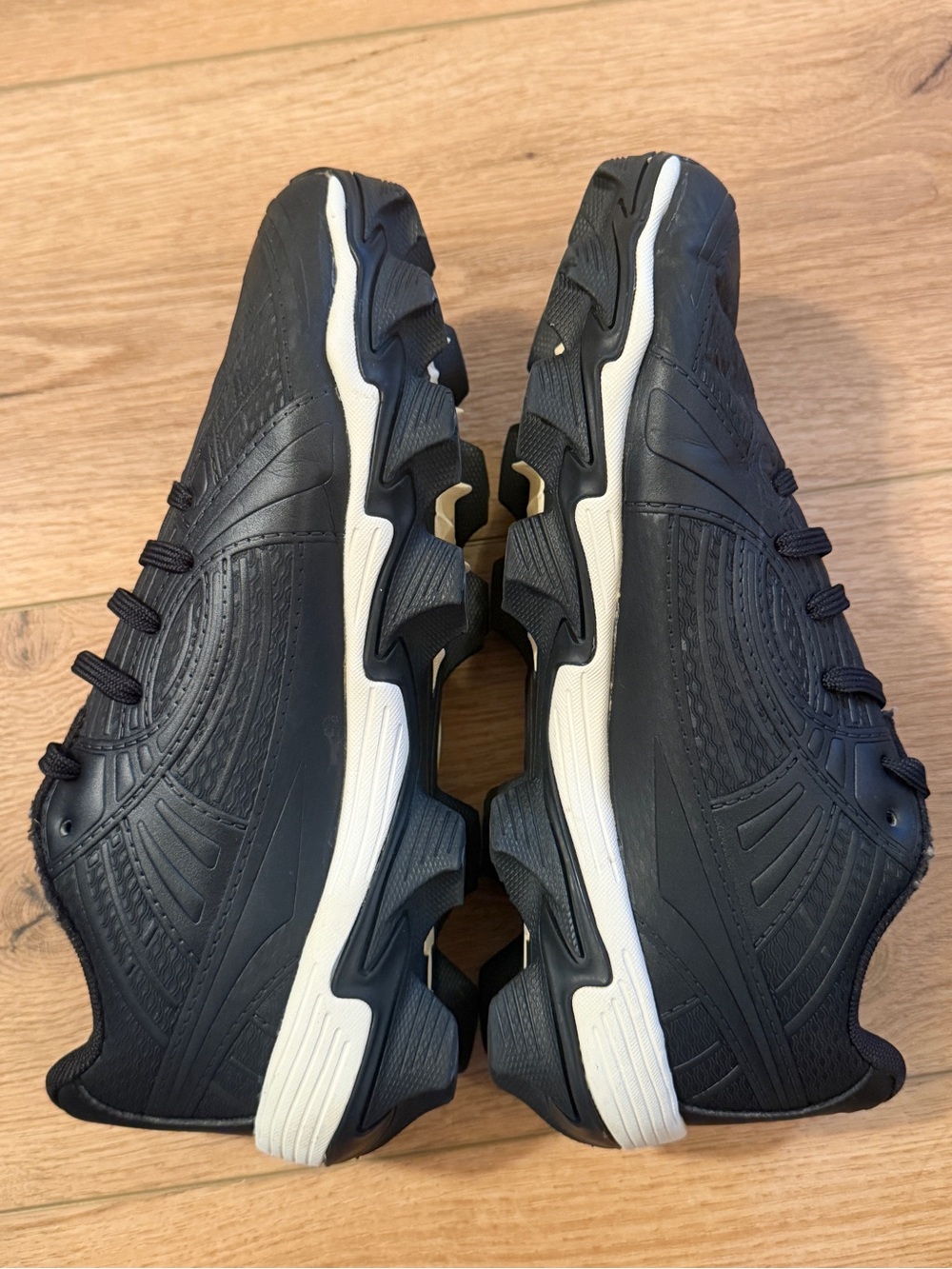 Under Armour Black and White Kids Athletic Cleats